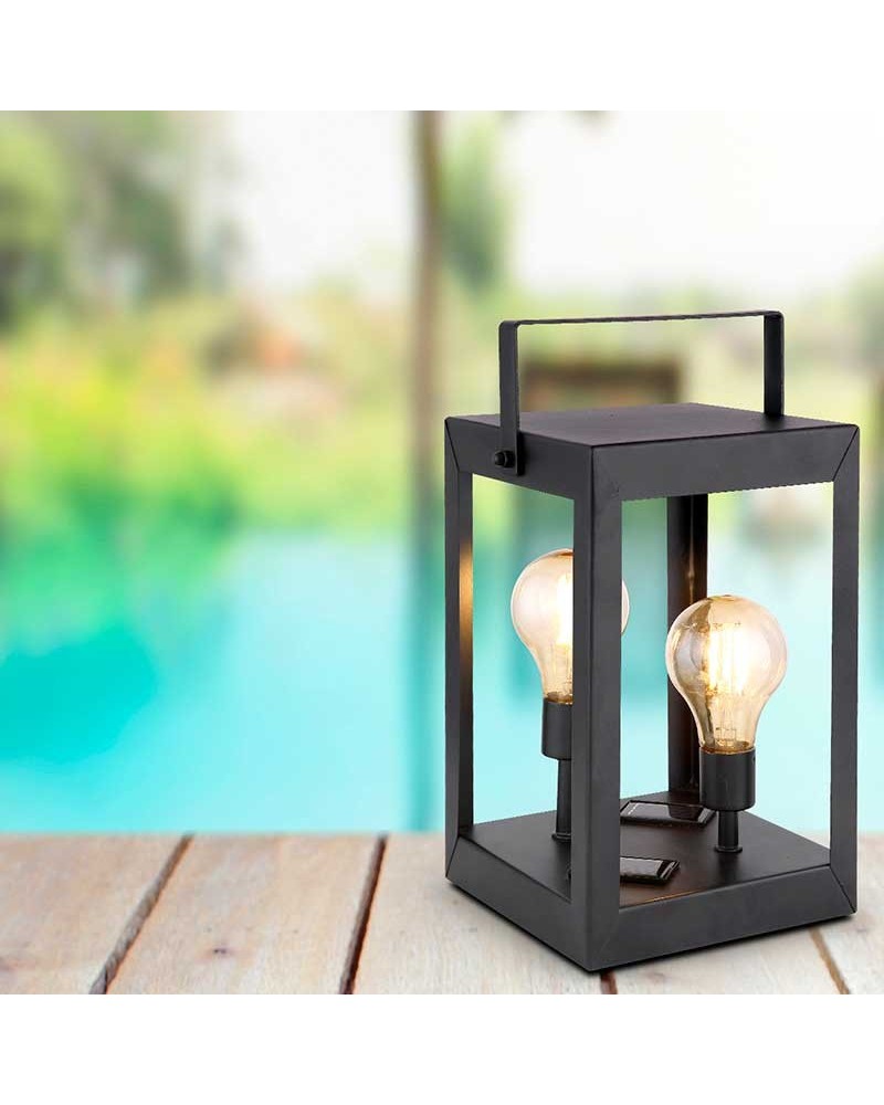 Farol rectagular solar negro con asa dos bombillas plástico ambar y metal 23cm